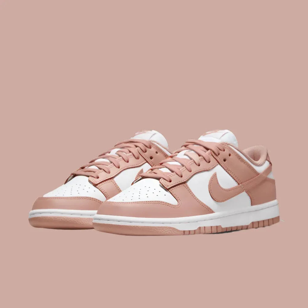 Pair of pink and white sneakers on a