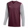 Camiseta de manga larga Jordan Dri-FIT con media cremallera para hombre, estilo fútbol americano.