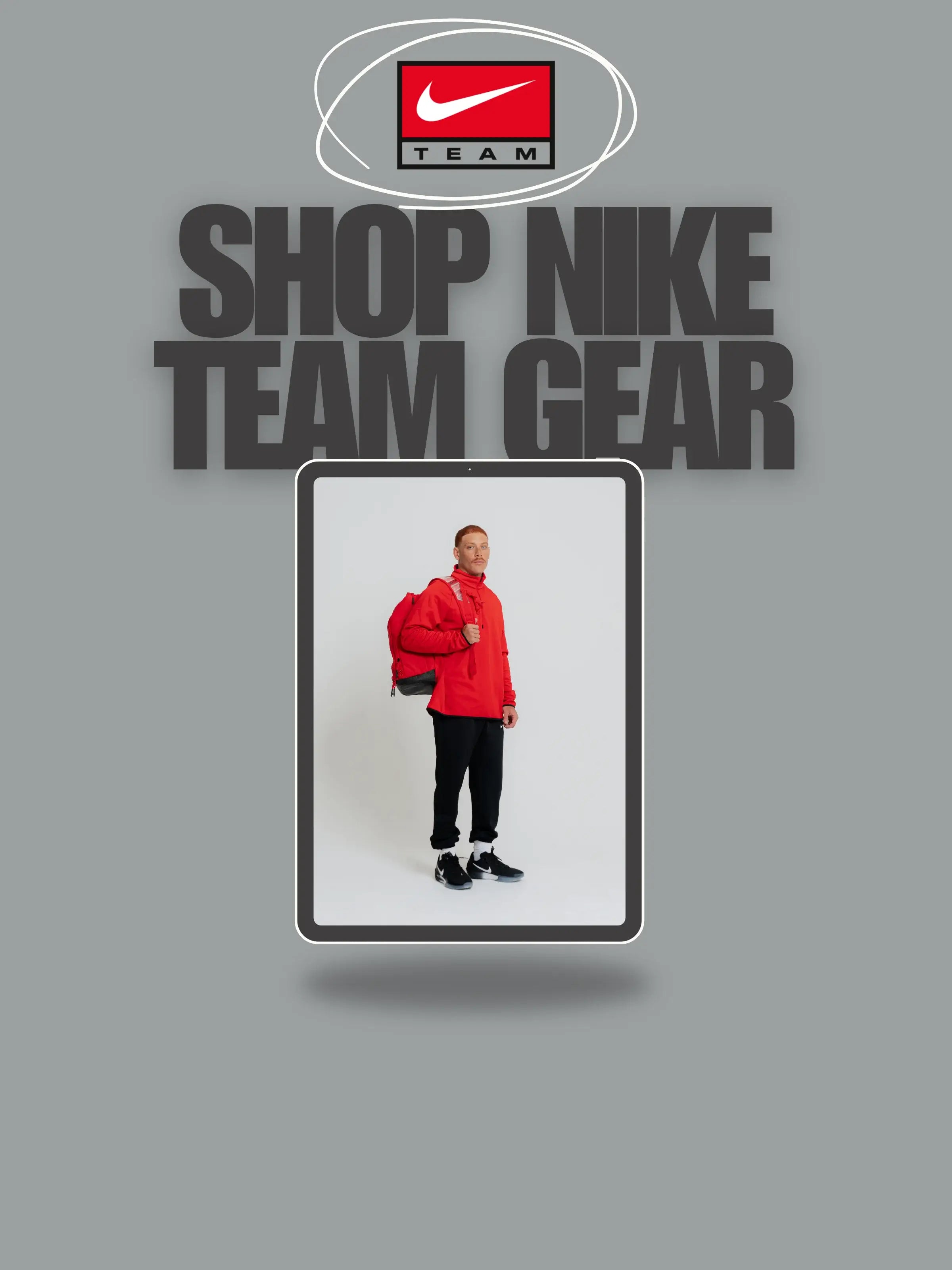 Nike Team Gear with a person in a red jacket holding a bag
