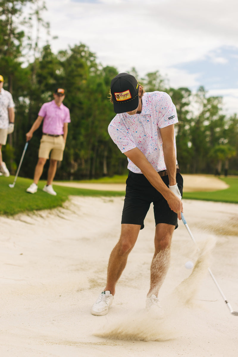 Polo blanco con salpicaduras de pintura