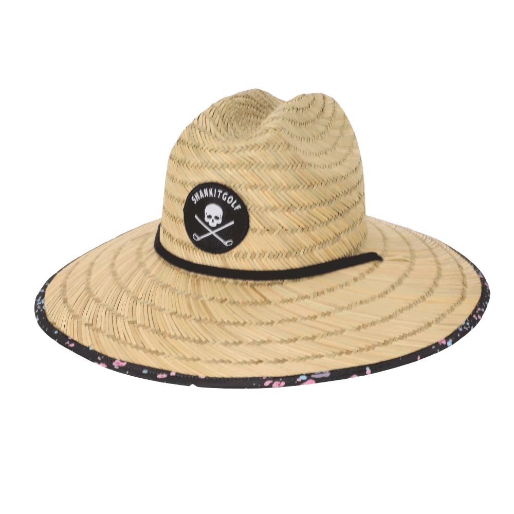 Sombrero de paja con salpicaduras de pintura